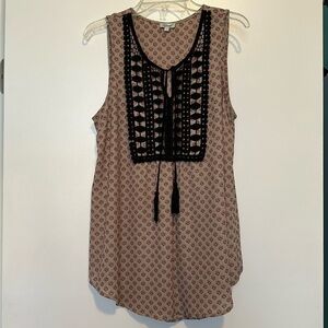 Cute sleeveless top with tie up accent
